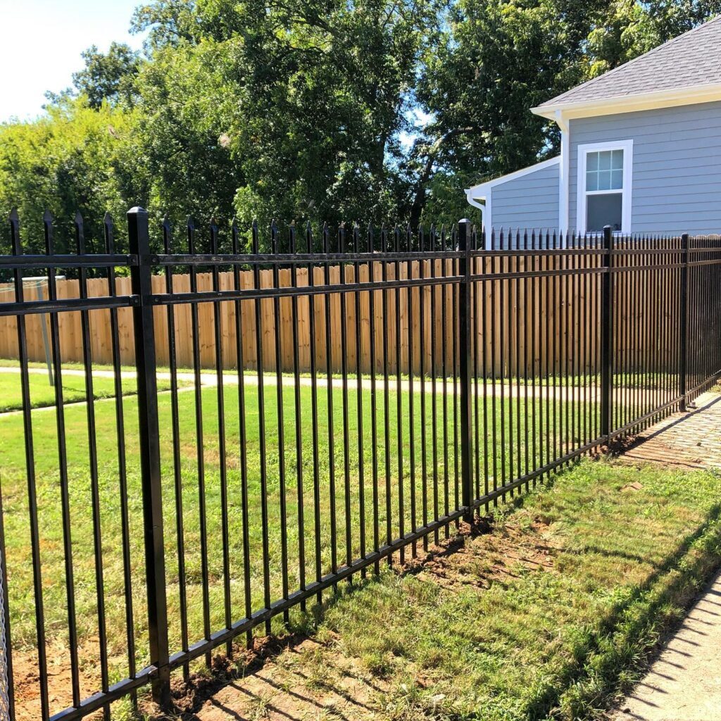 Wrought iron fence installation